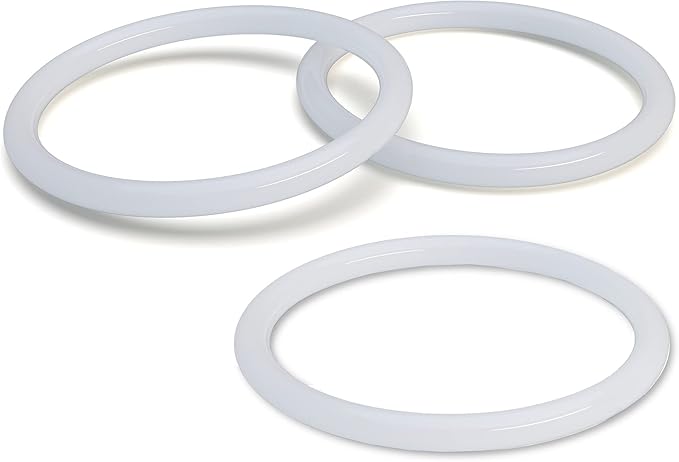 Three rubber gaskets on a white background