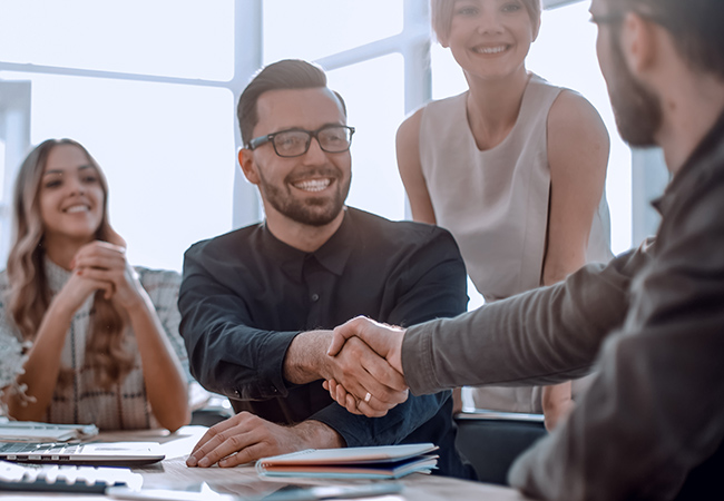 group people shaking hands